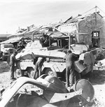 Captured Schwerer Panzerspahwagen (Fu) Sd. Kfz 232 (8-rad) being repaired, Tobruk 