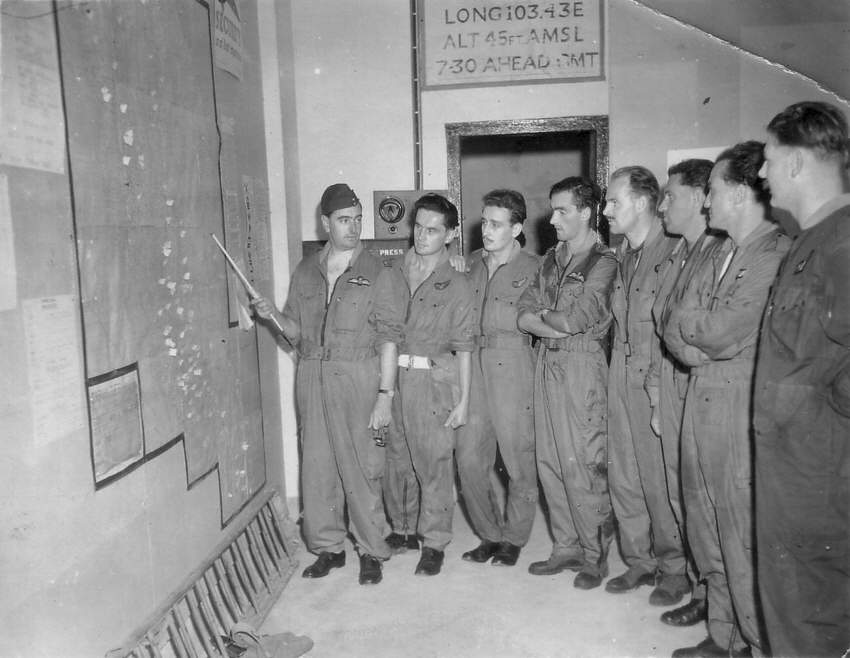 No.100 Squadron being Briefed 