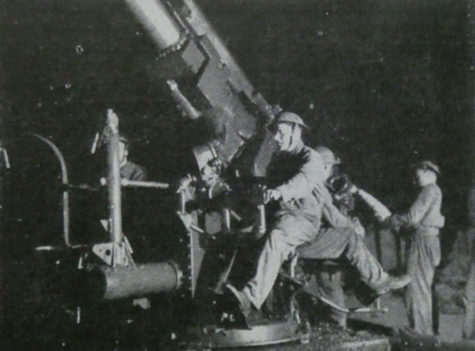 Night view of 3.7in AA gun during Flying Bomb campaign 