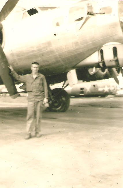 Bob Tucker Sr under nose of B-17 