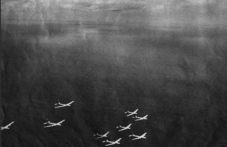 Formation of Boeing B-29s over the Ocean 