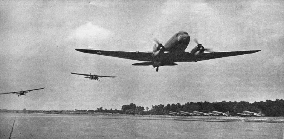 Douglas C-47 towing two Waco CG-4A Gliders 