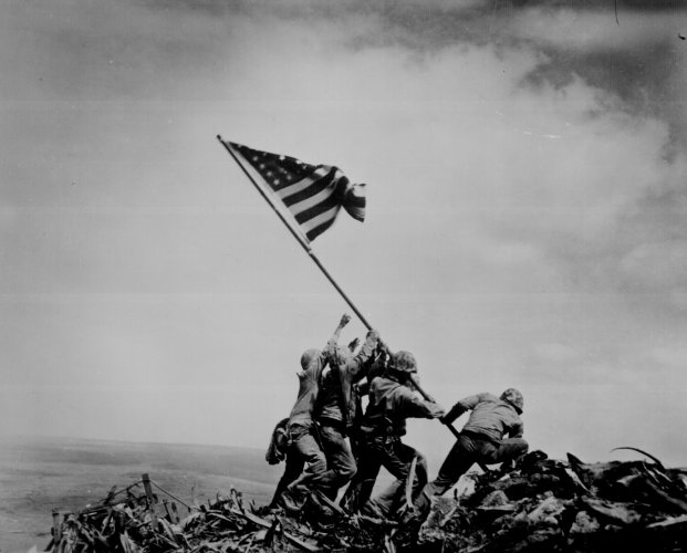 The picture of the Stars and Stripes being raised on Mount Suribachi on 23 February 1945