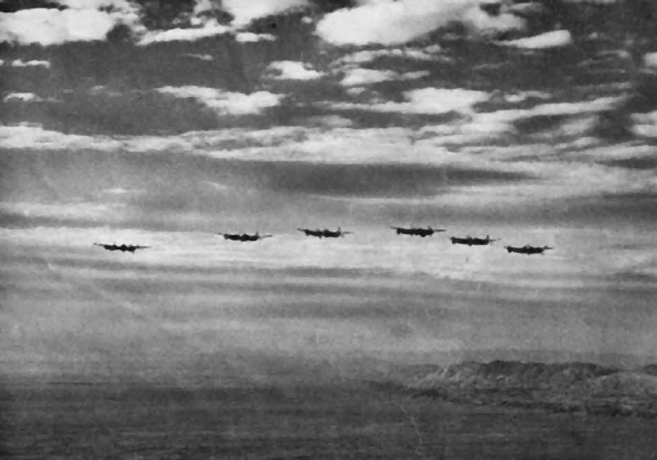Formation of Lockheed P-38 Lightnings from the front 
