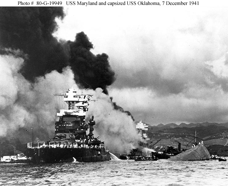 USS Maryland and capsized USS Oklahoma during the Pearl Harbor raid