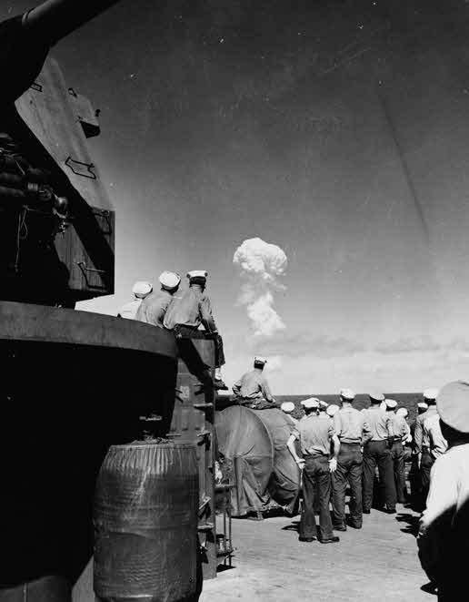 Crew of USS Fall River (CA-131) watch Able Day Atom Bomb, 1 July 1946 