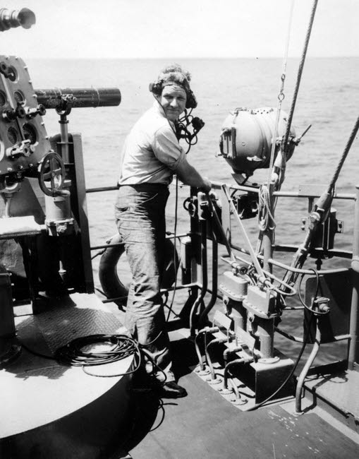Crewman on bridge of USS Jouett (DD-396) 