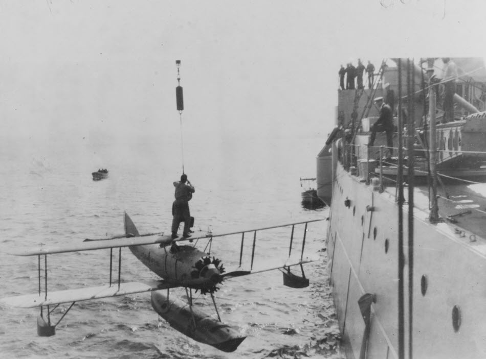 Vought UO-1 being lowered from USS Memphis (CL-13) 