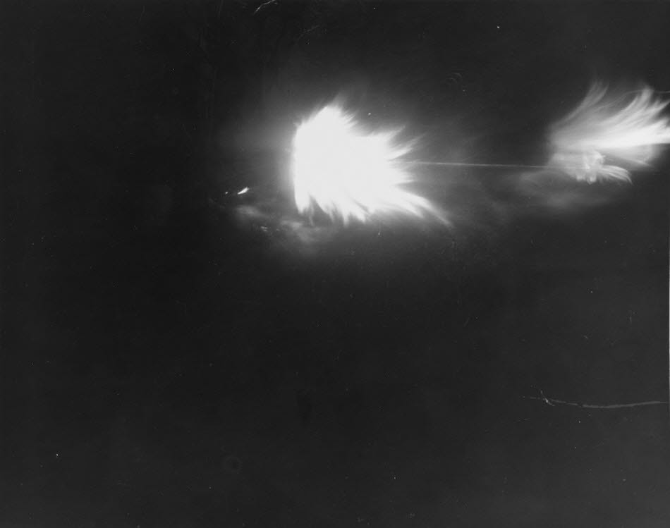 USS Nicholas (DD-449) firing on Japanese aircraft at night 