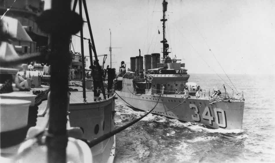 USS Perry (DD-340) refueling from USS Pennsylvania (BB-38)