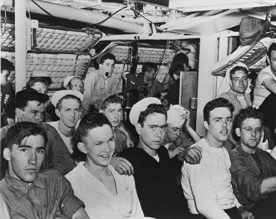 Audience waiting for movie to start, USS Stevens (DD-479) 