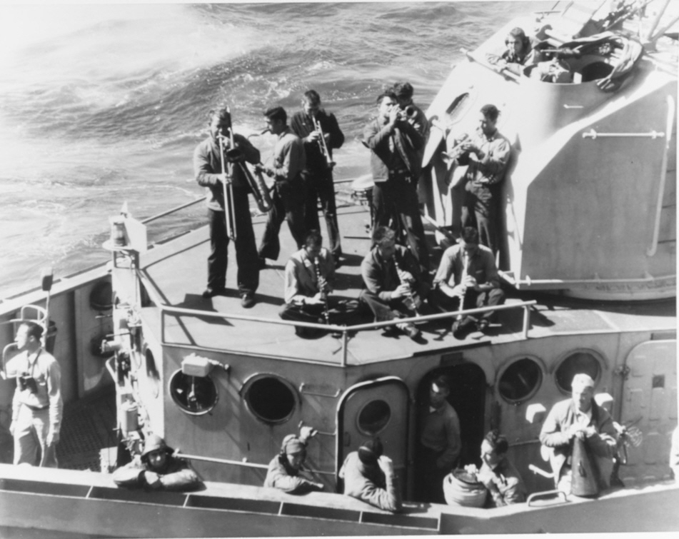 Band playing on USS Wallace L Lind (DD-703), 26 March 1945 
