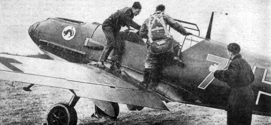 Luftwaffe Pilot climbing into Messerschmitt Bf 109