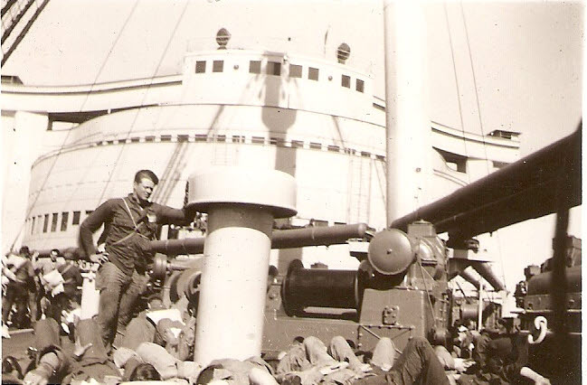 Eugenne Gifford on deck of RMS Queen Elizabeth 