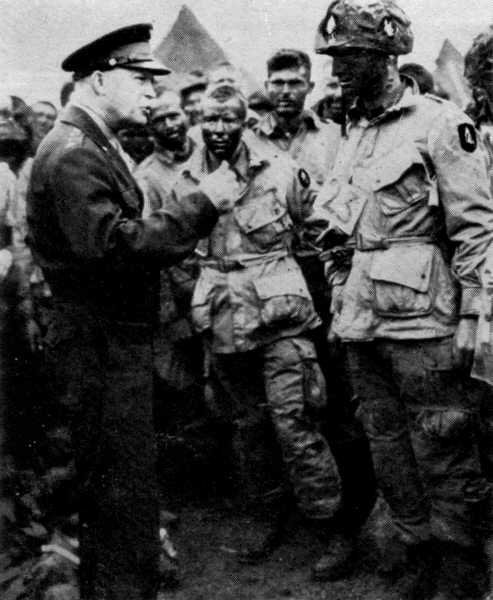 General Eisenhower meets a group of paratroops before D-Day