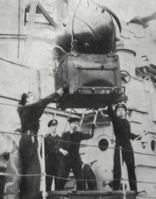 Loading a mine onto HMS Manxman 