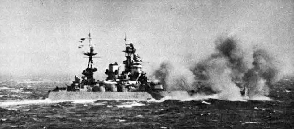HMS Nelson firing main guns 