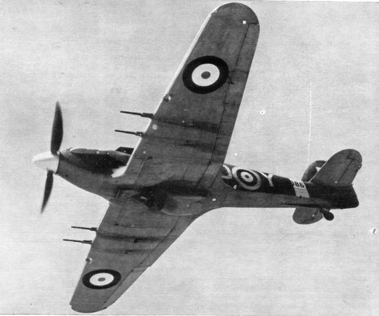 A view of the Hawker Hurricane IIC from below, showing the four 20mm cannon