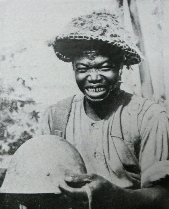 Nigerian Soldier with Japanese trophy, Burma 