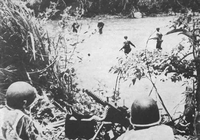 US Soldiers crossing a river, New Guinea 