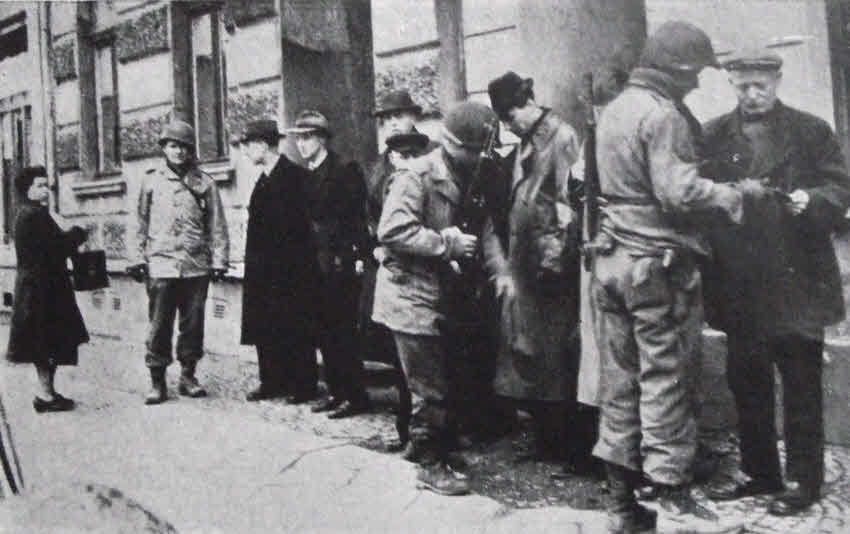 US Troops search civilians at Krefeld, 1945 