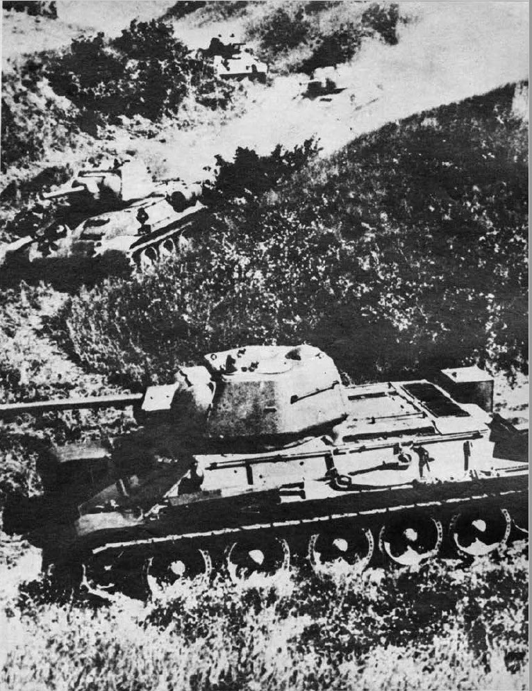 T-34 Model 1943s on hillside road 