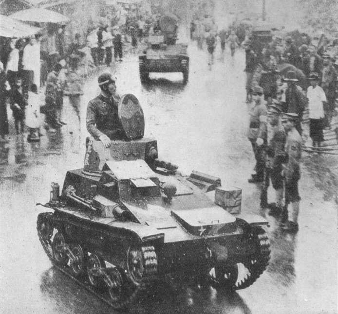 A Japanese Type 94 Tankette entering the French concession at Shanghai at the end of July 1940