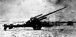 10cm schwere Kanone 18 in firing position 