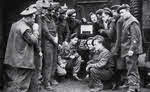 21st Army Group troops listen to news of surrender 
