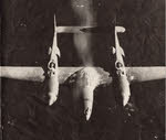Lockheed P-38 Lightning firing its guns 