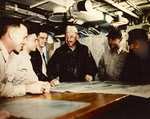 Senior Officers of USS Bennington (CV-20) explaining raid, mid 1945 