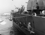Crew chipping paint on USS Black (DD-666), 1968 