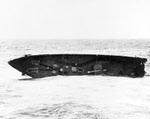 Detached bow from USS Ernest G Small (DD-838) floats away, 1951 