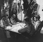 Pilots on USS Hornet (CV-12) playing cards 