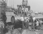 Preparing to hoist 16in gun onto USS Iowa (BB-61) 