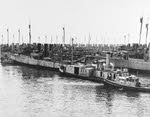 USS Long (DD-209) being towed out of storage, San Diego, 1929 