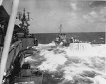 USS Lowry (DD-770) coming alongside USS Yorktown (CV-10), Okinawa, 1945 