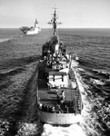USS Maddox (DD-732) behind USS Philippine Sea (CVA-47), 1954 