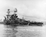 USS Nevada (BB-36) being towed to Drydock 