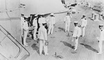 Captain plays ring toss, USS New York (BB-34) 
