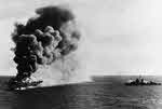 USS Ommaney Bay (CVE-79) on fire, 4 January 1945