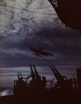 Grumman F6F makes dusk landing, USS Randolph (CV-15)
