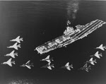 F8U Crusaders of VF62 over USS Shangri La (CV-38)