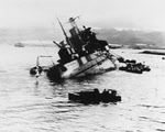 USS Utah (BB-31) capsizing at Pearl Harbor 