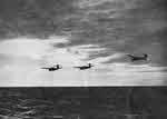 Formation of Fairey Barracudas over the Sea 