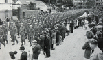 Canadians parading through Dieppe, 1944 