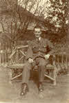 Charles Edward Rendell seated, aged 19 