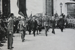 Charles de Gaulle marching through Arc de Triomphe 