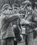 German POWs eating Bully Beef, Falaise 