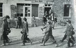 German POWs in village near Caumont 